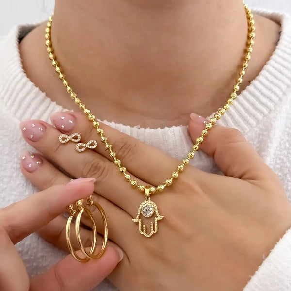 Conjunto De Dama Con Cadena De Tejido Militar, Dije De Mano Jamsa, Topos De Infinito Y Candongas